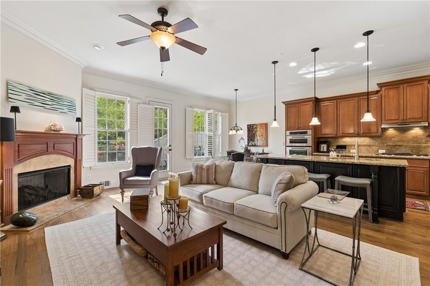 Set behind the gates of One Ivy Walk, this brick townhome offers - photo 4