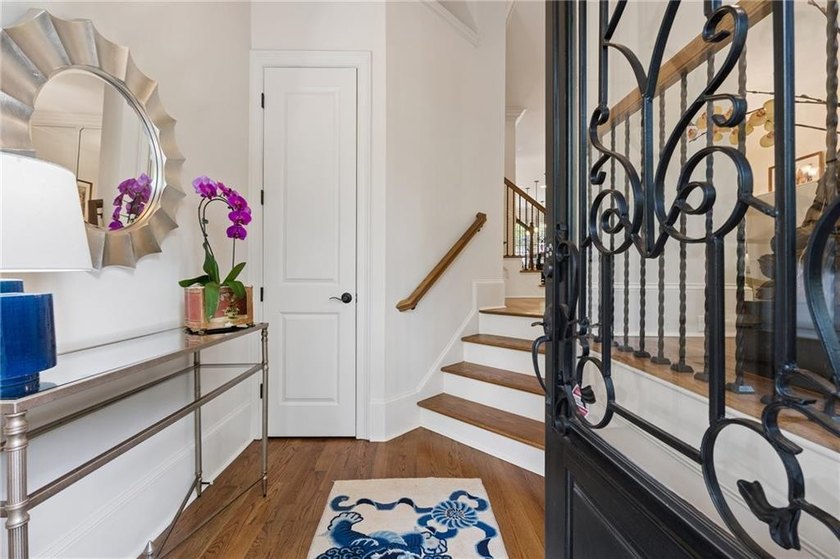 Set behind the gates of One Ivy Walk, this brick townhome offers - photo 8