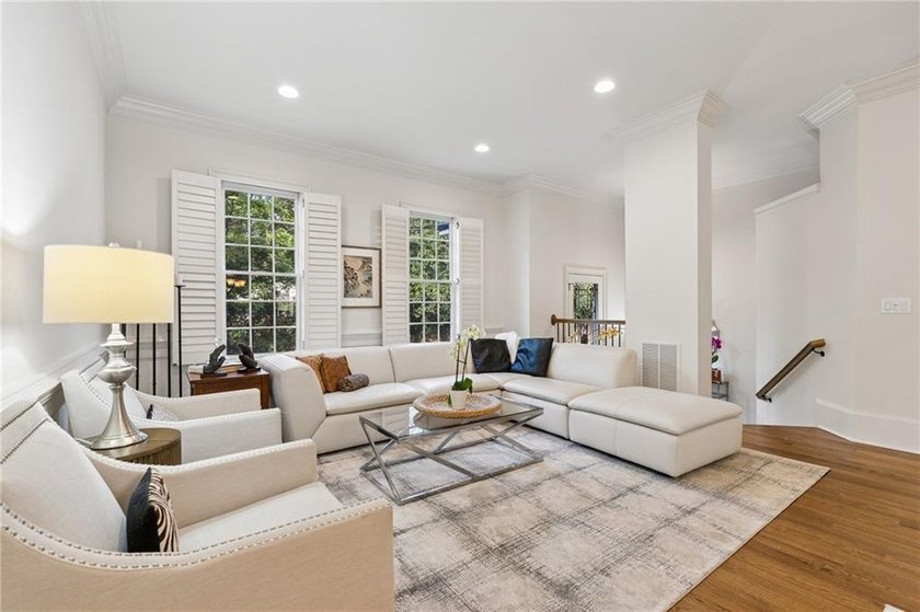 Set behind the gates of One Ivy Walk, this brick townhome offers - photo 9
