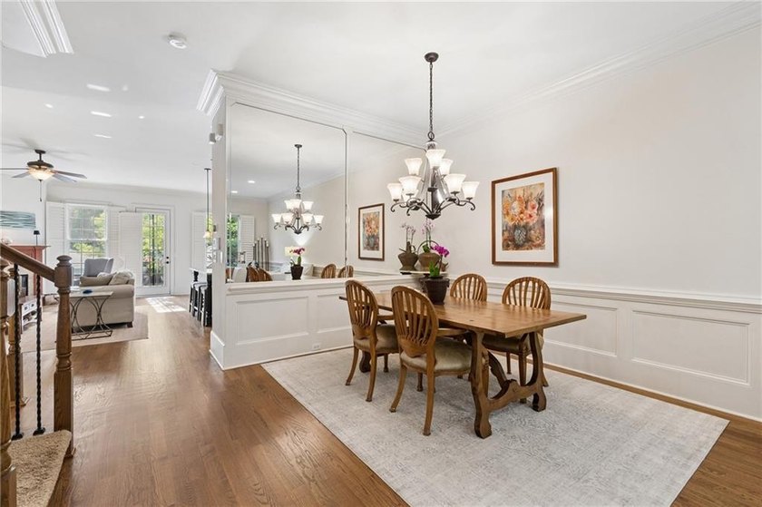 Set behind the gates of One Ivy Walk, this brick townhome offers - photo 10