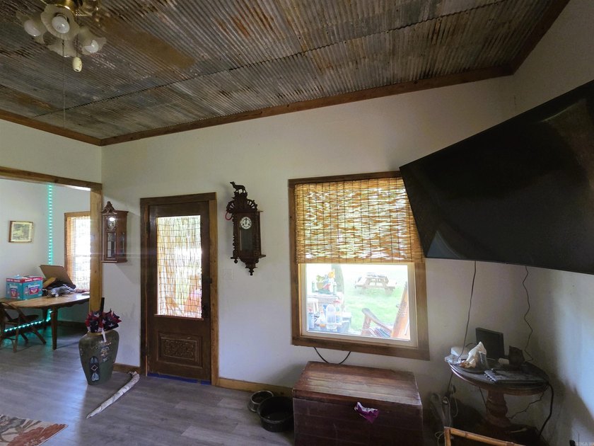 Charming Mena Home with Modern Upgrades &amp; Endless Potential! - photo 11