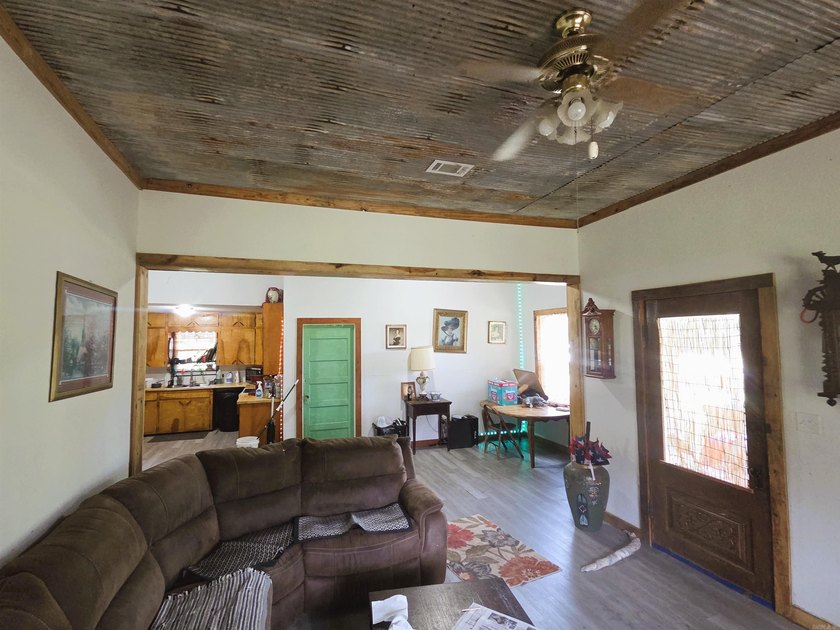 Charming Mena Home with Modern Upgrades &amp; Endless Potential! - photo 12