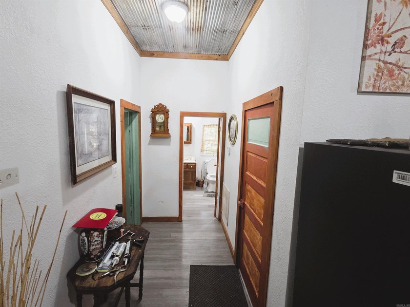 Charming Mena Home with Modern Upgrades &amp; Endless Potential! - photo 14