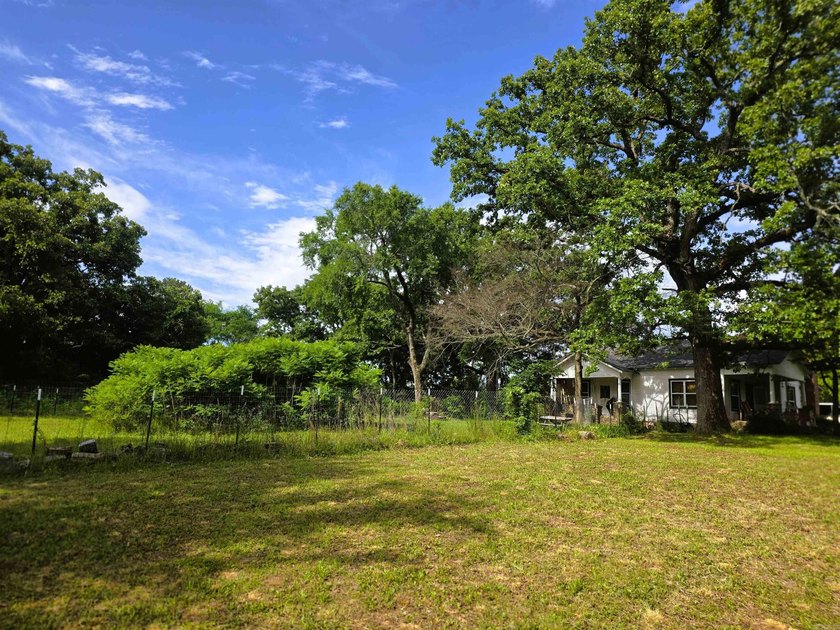 Charming Mena Home with Modern Upgrades &amp; Endless Potential! - photo 30