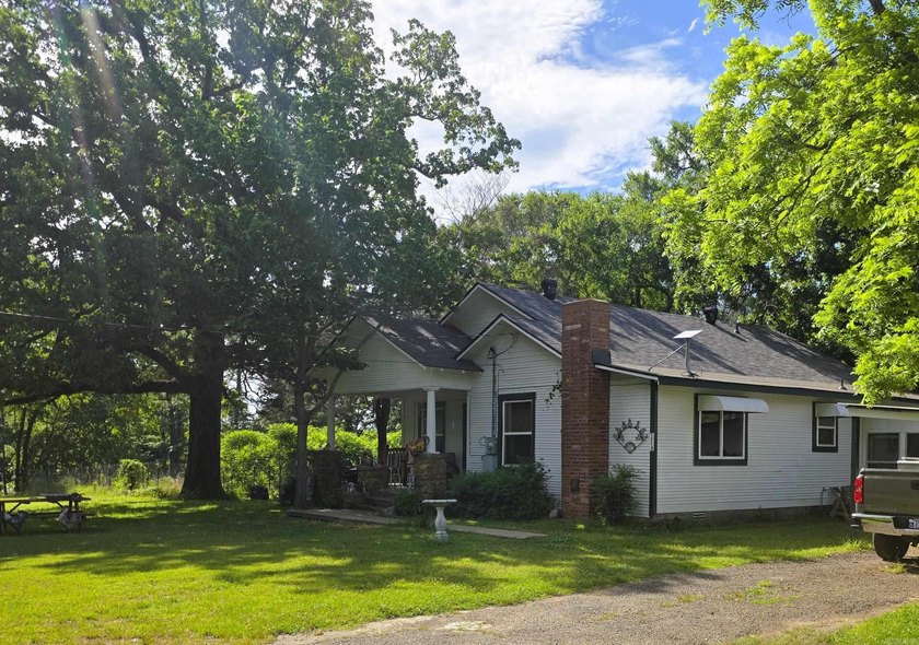 Charming Mena Home with Modern Upgrades &amp; Endless Potential! - photo 39