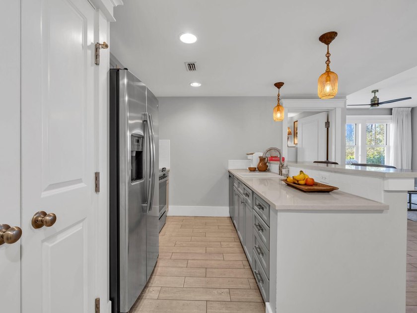 Welcome to this beautifully updated 2-bedroom, 2-bath ground - photo 3
