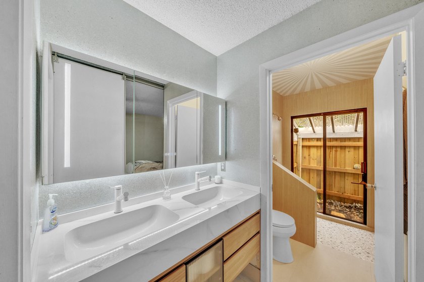Welcome home to this beautifully maintained and thoughtfully - photo 11