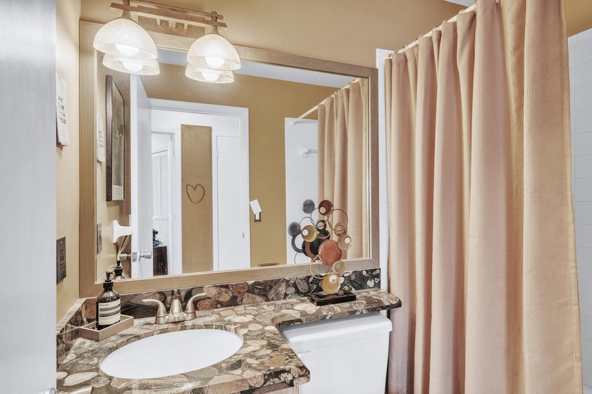 Welcome home to this beautifully maintained and thoughtfully - photo 21