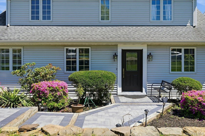 From the moment you arrive, the home's timeless Colonial design - photo 3