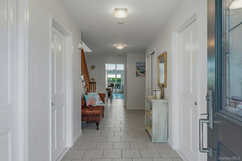 From the moment you arrive, the home's timeless Colonial design - photo 4