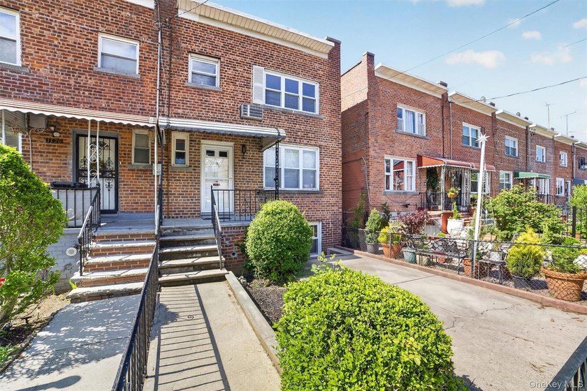 Refreshed and charming 3-bedroom tri-level brick home features a - photo 2
