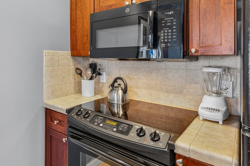 Discover a rare opportunity to own two condos in one -- a - photo 10
