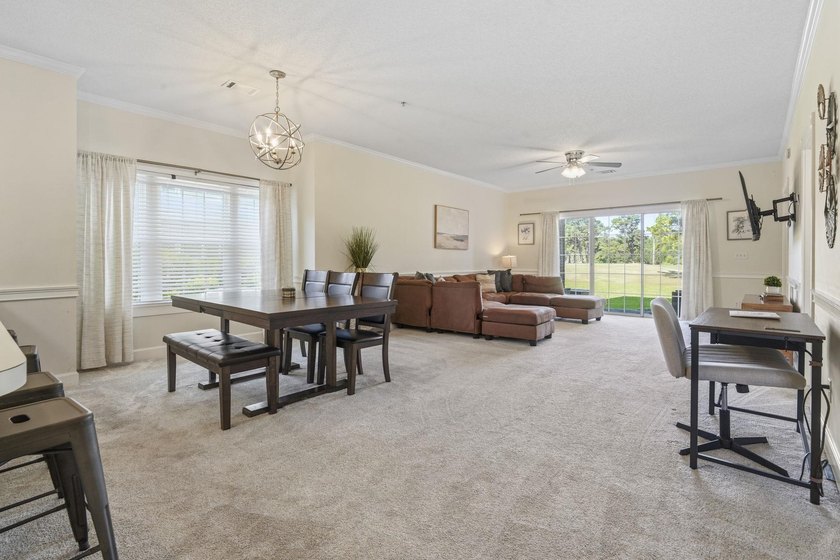 Welcome to this beautiful first-floor end-unit condo in the - photo 13