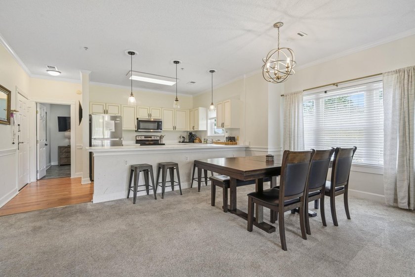 Welcome to this beautiful first-floor end-unit condo in the - photo 15