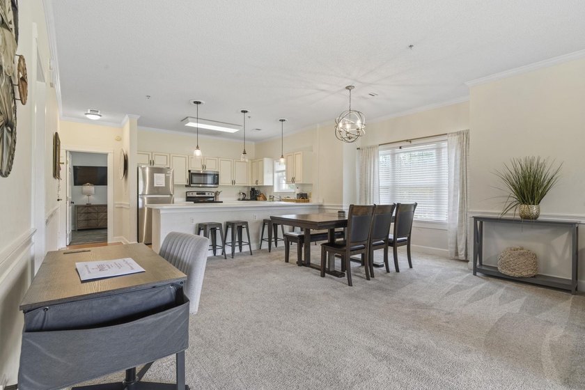 Welcome to this beautiful first-floor end-unit condo in the - photo 16