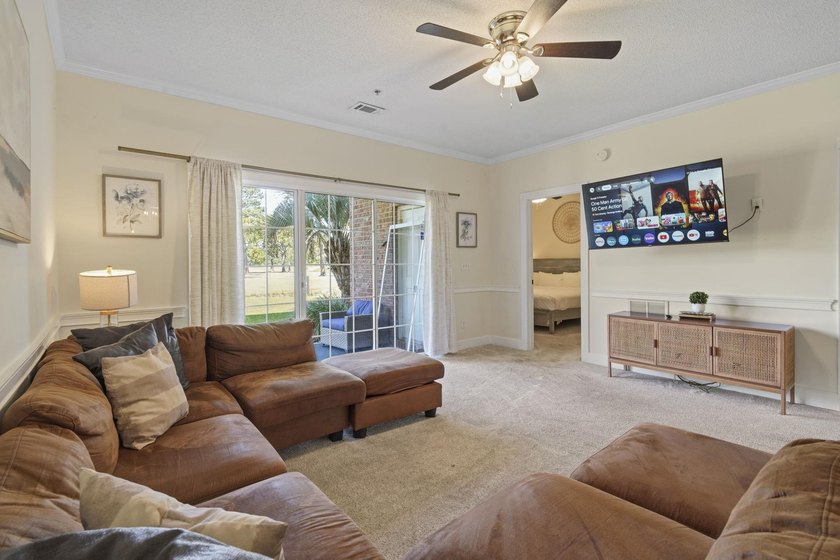 Welcome to this beautiful first-floor end-unit condo in the - photo 18