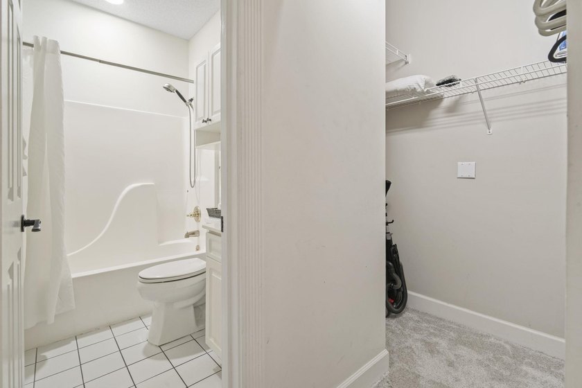 Welcome to this beautiful first-floor end-unit condo in the - photo 22