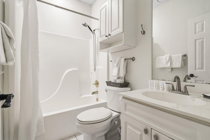 Welcome to this beautiful first-floor end-unit condo in the - photo 23