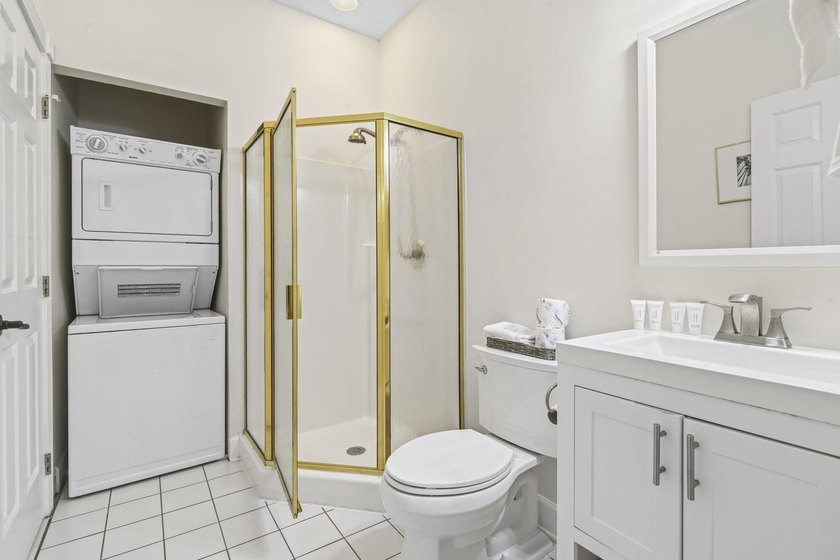 Welcome to this beautiful first-floor end-unit condo in the - photo 24