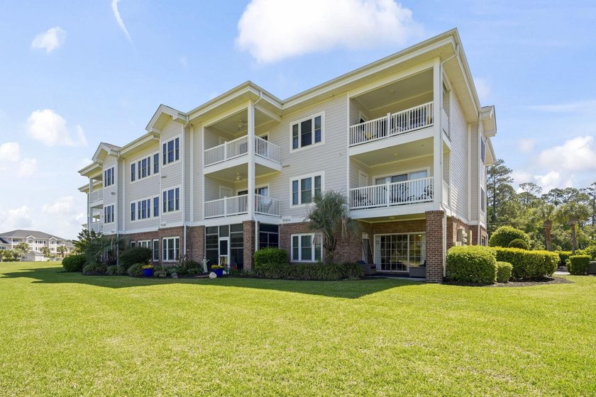 Welcome to this beautiful first-floor end-unit condo in the - photo 27