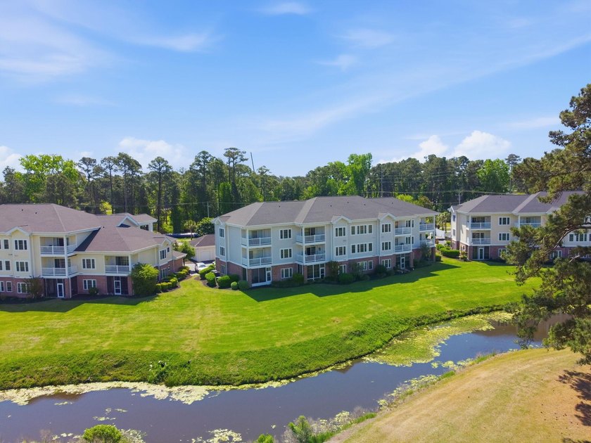 Welcome to this beautiful first-floor end-unit condo in the - photo 34