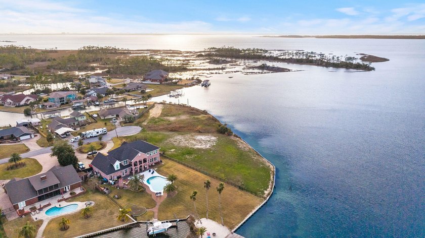 Incredible WATERFRONT OPPORTUNITY offering .76 ACRES of pristine - photo 9