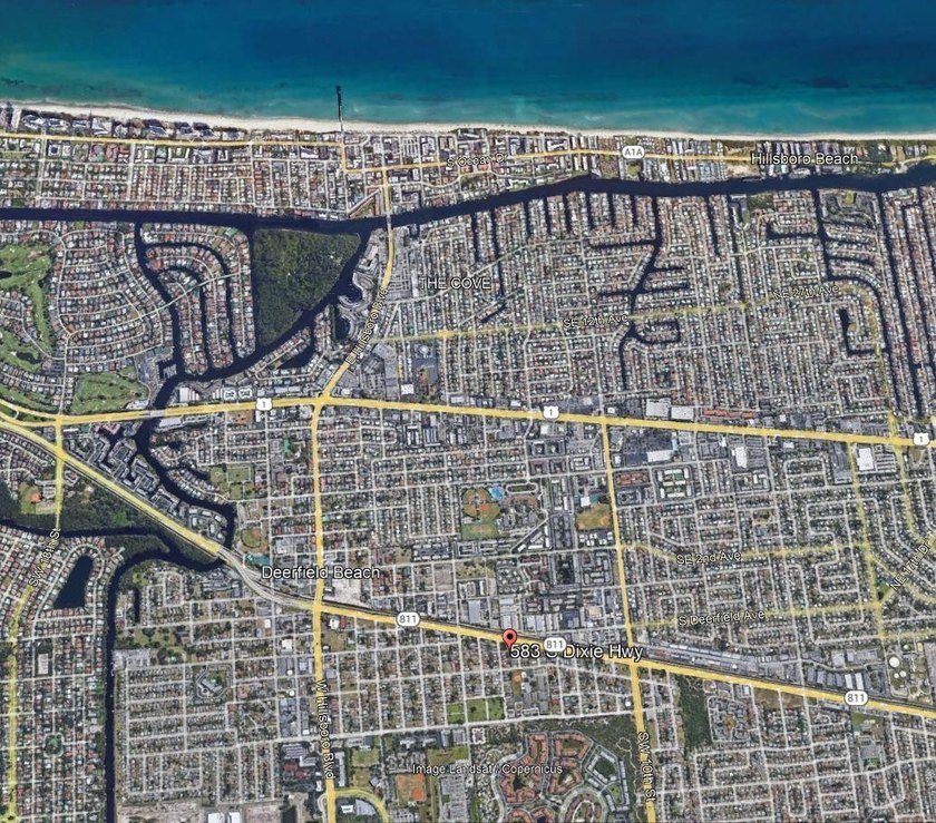 This 11,876 Sq. Ft. vacant land parcel is situated on 105' of - photo 2