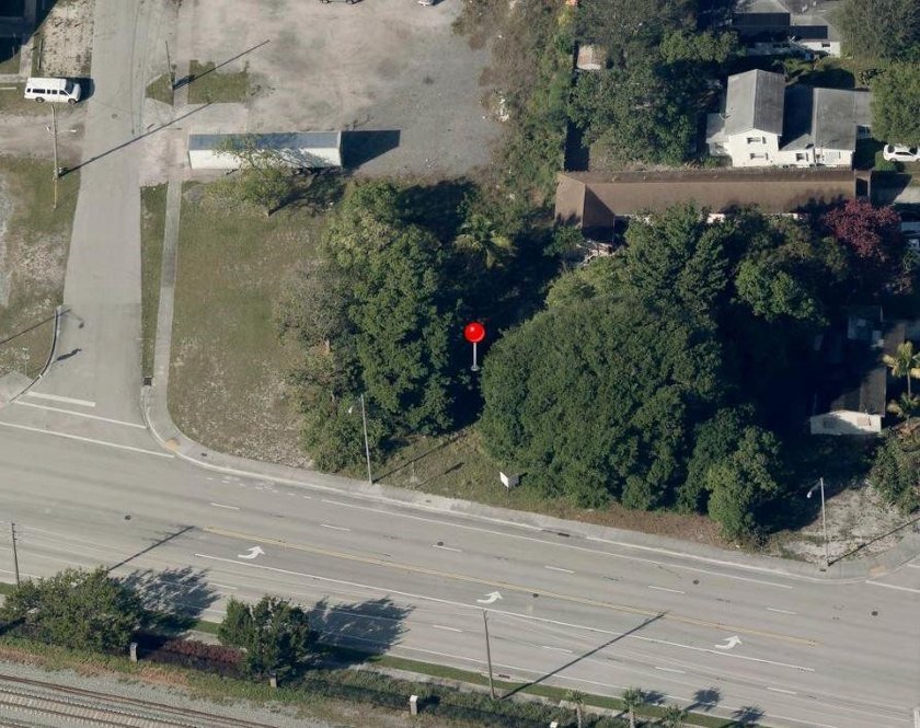 This 11,876 Sq. Ft. vacant land parcel is situated on 105' of - photo 3