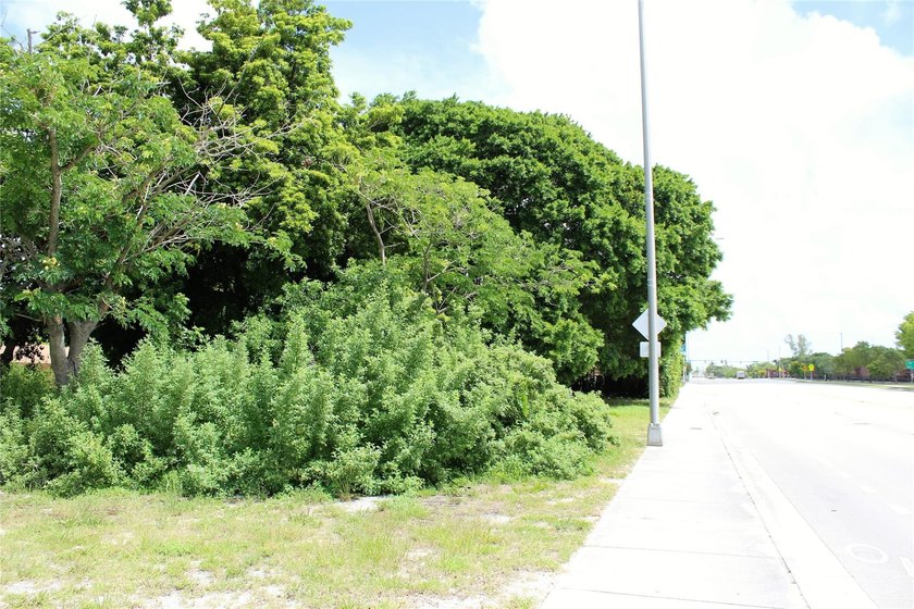 This 11,876 Sq. Ft. vacant land parcel is situated on 105' of - photo 8