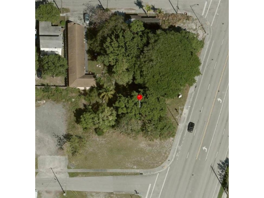 This 11,876 Sq. Ft. vacant land parcel is situated on 105' of - photo 9