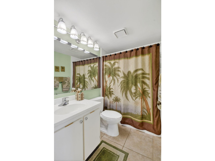 This corner unit, located on the 2nd floor, boasts impact glass - photo 39
