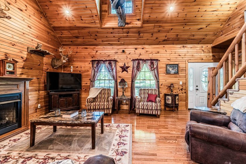 Stunning 3 bedroom, 2.5 bath, 2,200 +/- square foot log home - photo 5