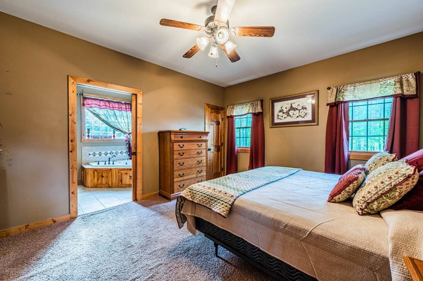 Stunning 3 bedroom, 2.5 bath, 2,200 +/- square foot log home - photo 9