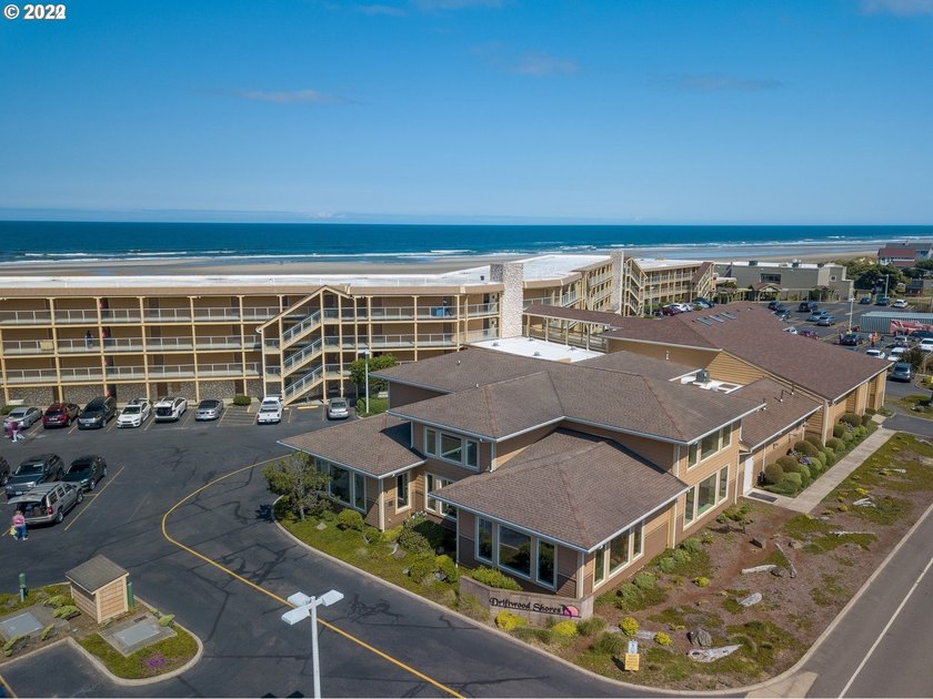 Oceanfront living at its best! A rare TOP floor unit ensures a - photo 6