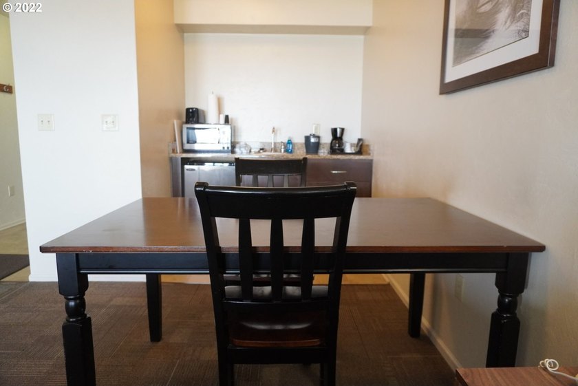 Oceanfront living at its best! A rare TOP floor unit ensures a - photo 10