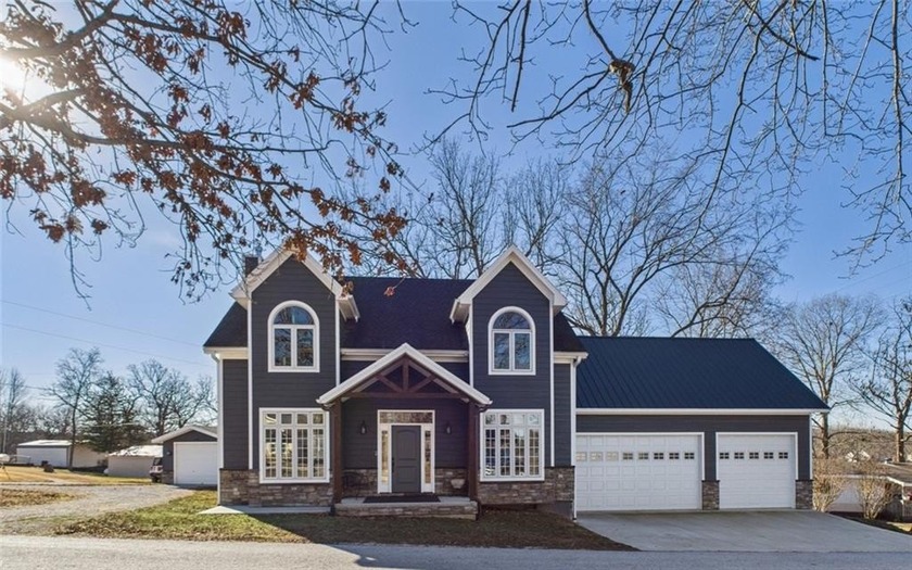Built in 2022 and situated on approximately 0.34 acres, this - photo 2