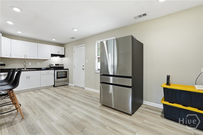 Charming 3 bedroom, 1 bath updated home situated on a completely - photo 11