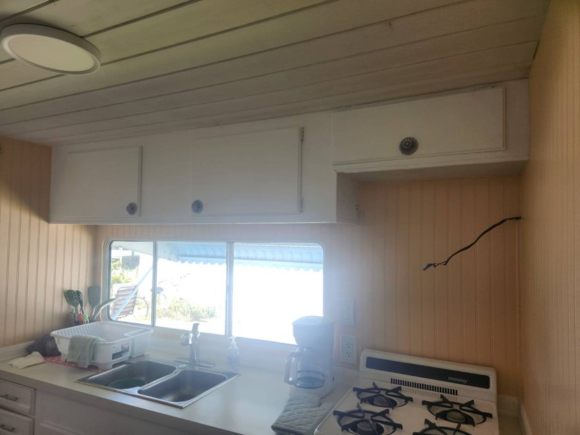 This waterfront home is a two bedroom and one full bath. This - photo 11
