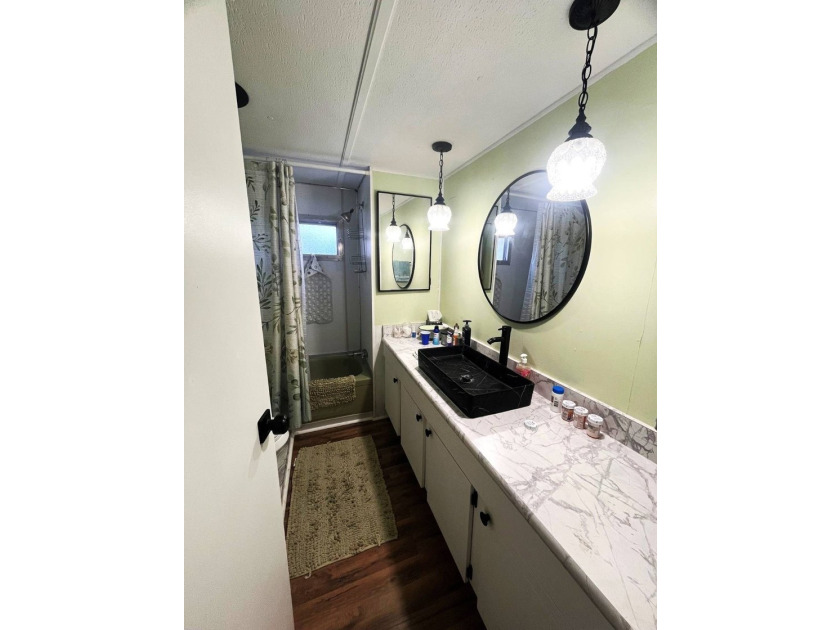 This lovely open-concept home has been beautifully updated with - photo 5