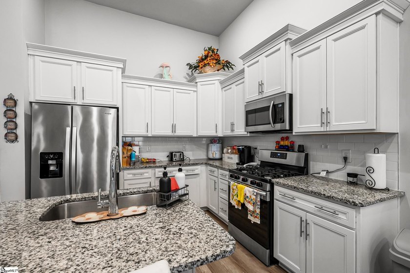 Welcome home to this beautifully designed townhome in the heart - photo 7