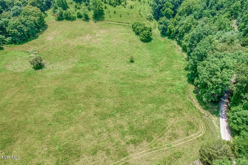 Enjoy 32+/- acres of open pasture and wooded land with - photo 8