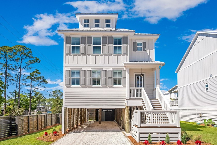 Discover coastal living at its finest in this beautifully - photo 2