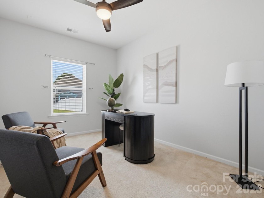 Welcome home to this beautifully appointed home in the highly - photo 19