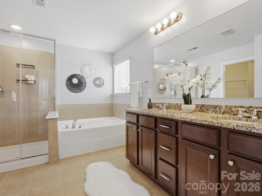 Welcome home to this beautifully appointed home in the highly - photo 24