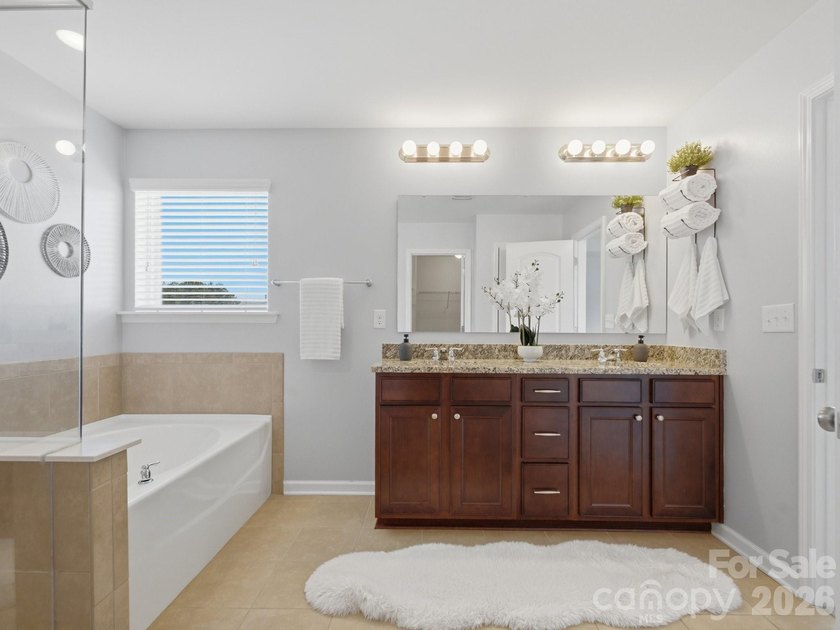 Welcome home to this beautifully appointed home in the highly - photo 27