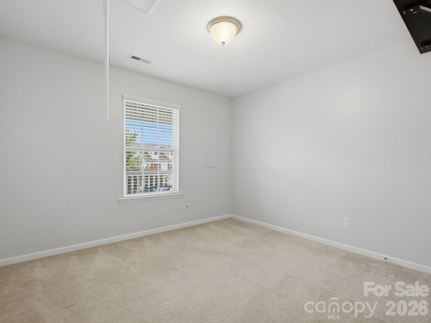 Welcome home to this beautifully appointed home in the highly - photo 32