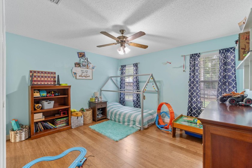 Welcome to Rocky Bayou Estates! This 3-bedroom, 2.5-bathroom - photo 21