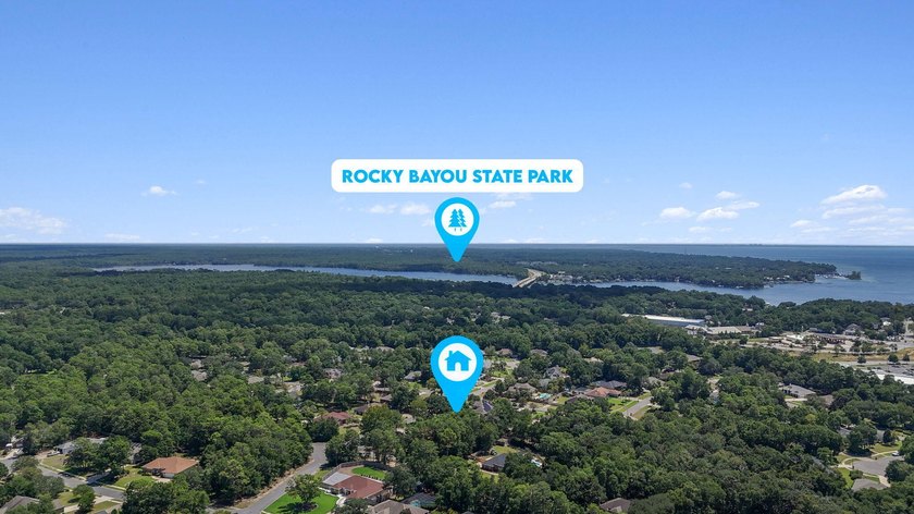 Welcome to Rocky Bayou Estates! This 3-bedroom, 2.5-bathroom - photo 43
