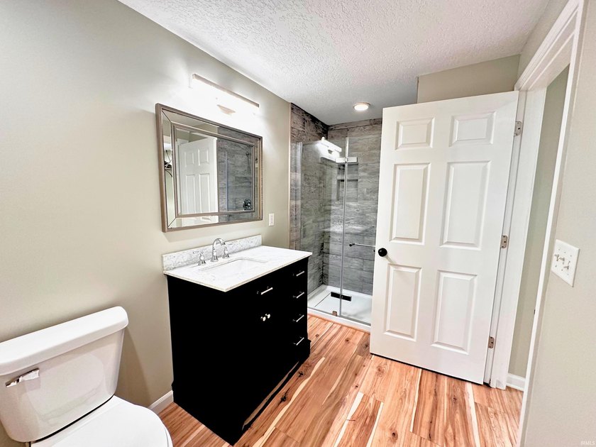 NO PROJECTS NEEDED! FULL RENO! This Irish Lake cottage is - photo 13