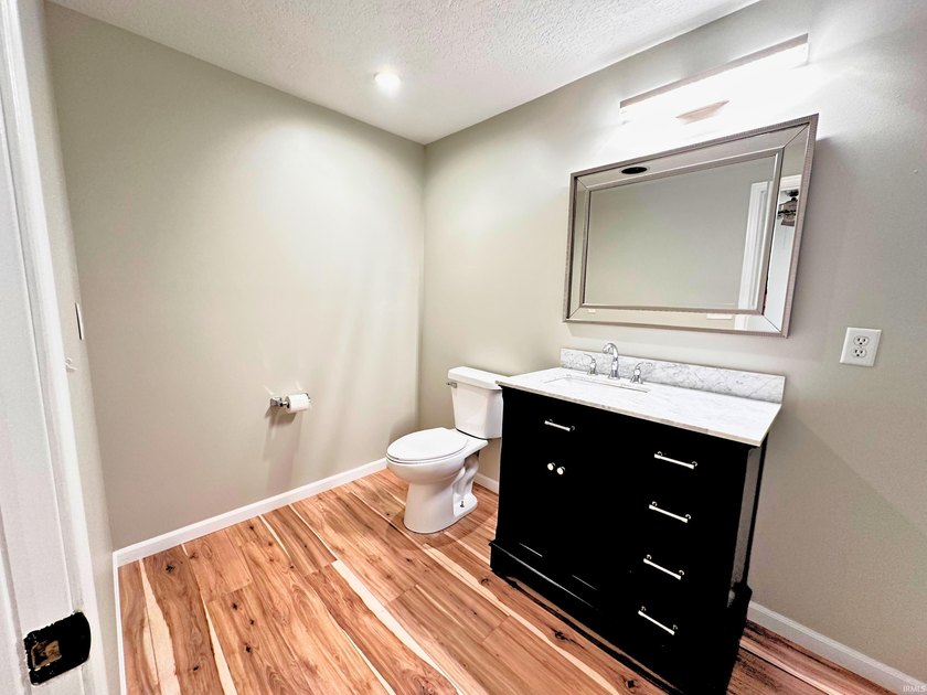 NO PROJECTS NEEDED! FULL RENO! This Irish Lake cottage is - photo 15